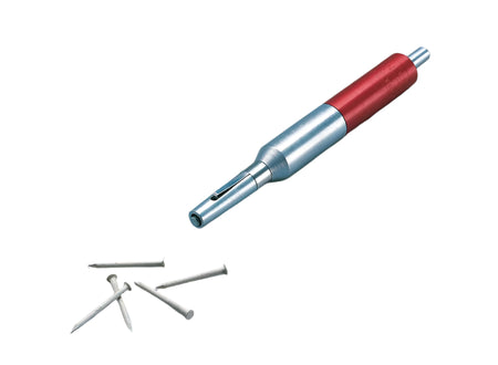 A Malco Trim Nail Punch with red and silver coloring, alongside several small silver nails.